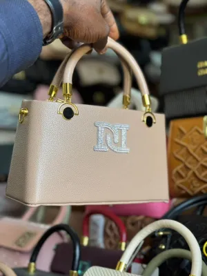 Diamond Luxe – Quilted Mini Bag with Silver Sphere Charm